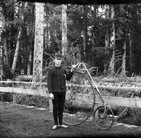 Man with bike in woods